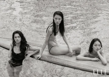 Three female models posing in swimwear by an outdoor pool for Elle China editorial photography.