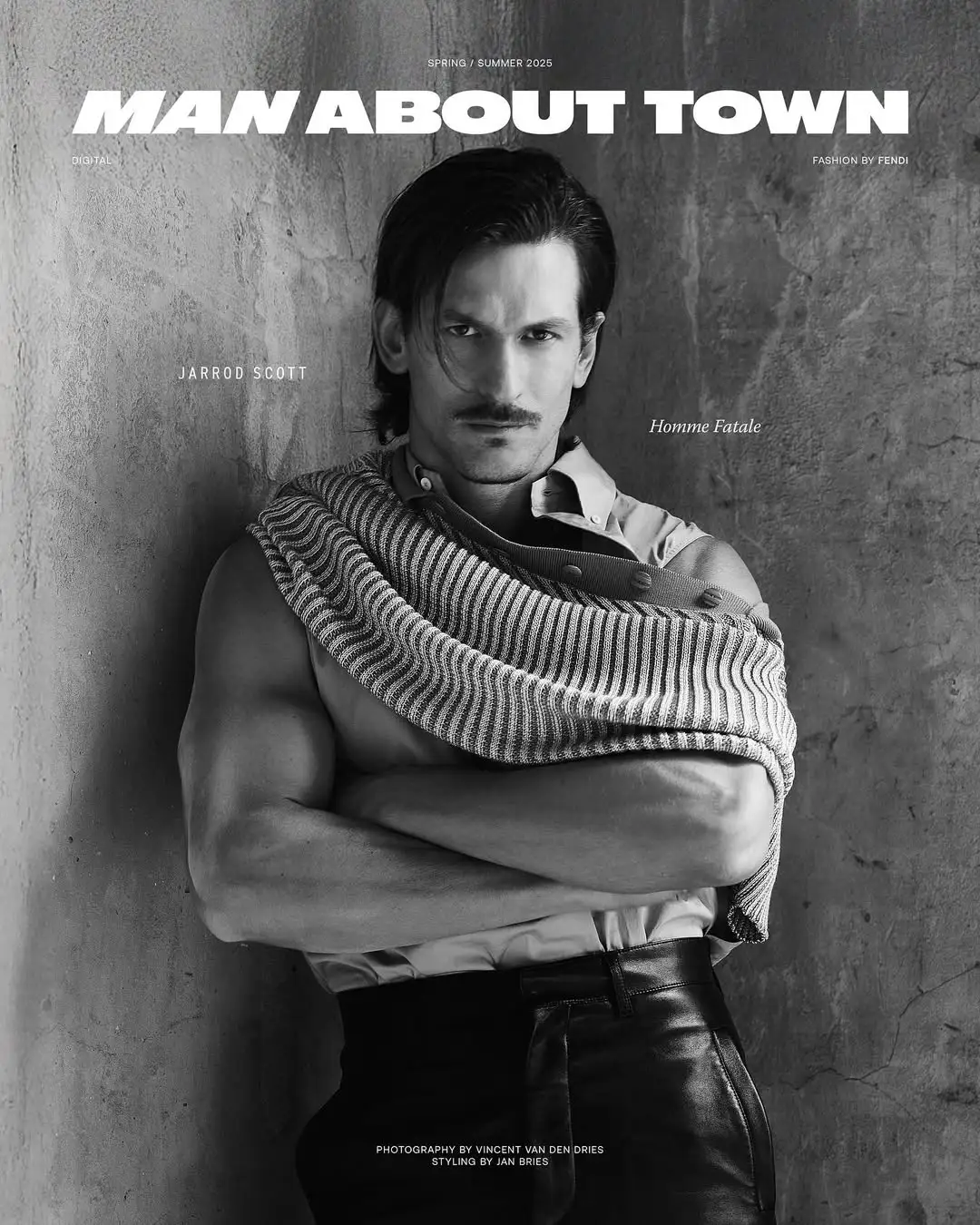 Man About Town magazine cover featuring a muscular man with mustache in shirt, leather pants and striped shirt draped on shoulder.