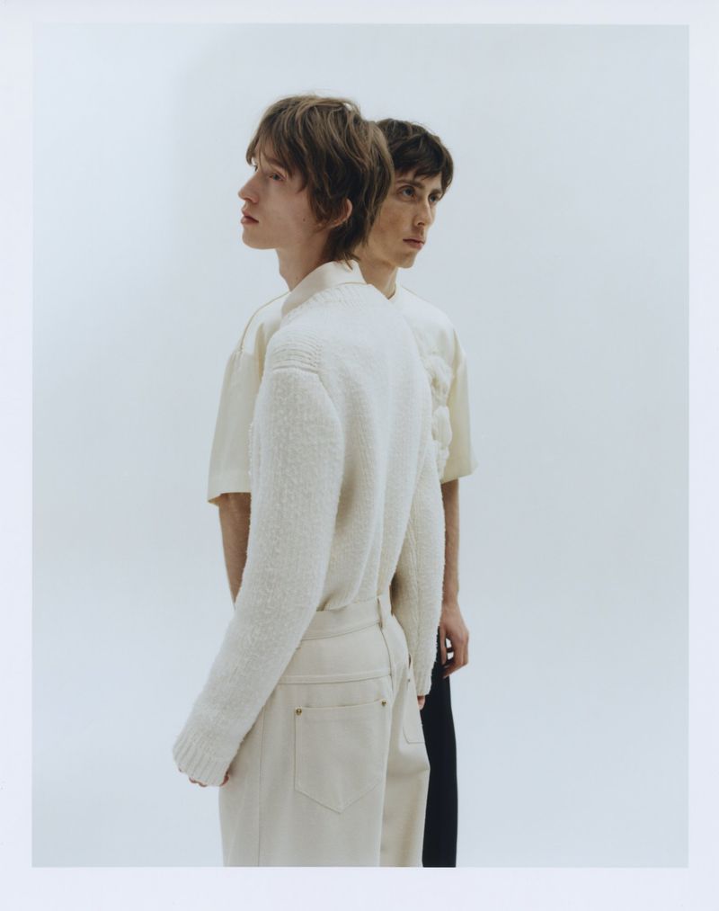 Two male models posing against a white studio background for The Greatest Magazine by photographer Johannes Brauner.