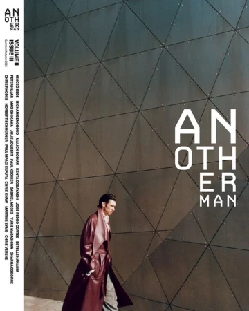 Magazine cover features a male model wearing a coat, walking against an abstract geometric background. The text 'Another Man' is visible.