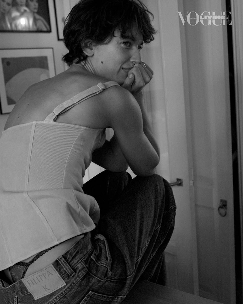 Model Gigi Ringel wearing a white top and jeans in a home interior for Vogue Living, photographed by Paul Bellaart in black and white.