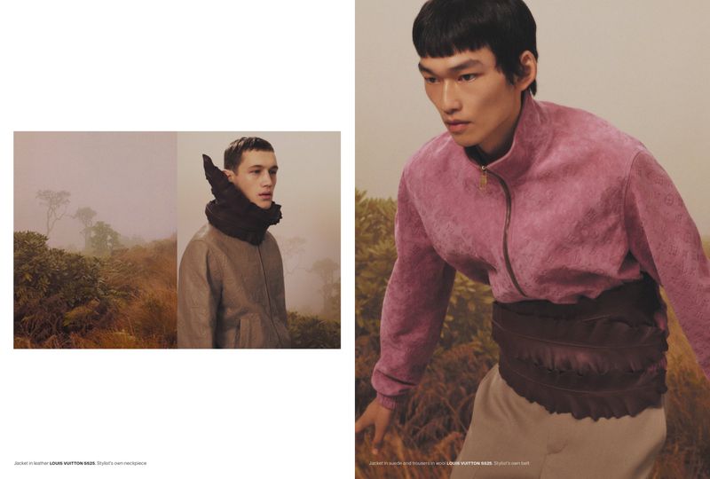 Fashion editorial featuring two Asian male models wearing Louis Vuitton jackets in an outdoor, foggy environment with neutral tones and earthy hues.