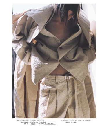 Model Dana Smith wearing a textured beige jacket and trousers for a Harper's Bazaar France editorial photographed by Marie Valognes.