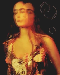 Portrait of a female model captured with multiple exposure motion blur against a dark background for Blau International.