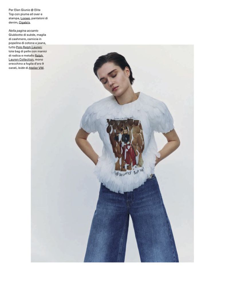 A fashion shot showcases a female model wearing a white graphic tee with feathered sleeves and wide-leg denim pants against a clean background.