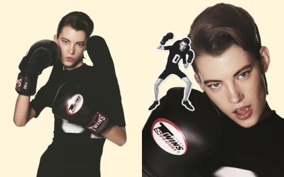 Model wearing black boxing gloves in a studio shot for Mastermind Magazine, photographed by David Sims.