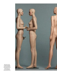 Three hairless mannequins standing against a textured grey studio background in Pop Magazine editorial