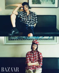 Model Chloe Oh in a plaid shirt and beret seated on a black leather sofa for Harper's Bazaar Korea editorial feature
