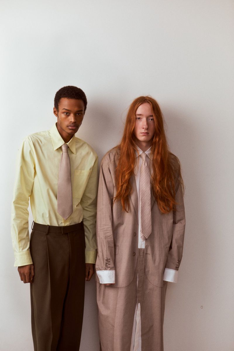 Two models standing against a white seamless background for Love Want Magazine editorial project I THINK I SAW YOU CRY.