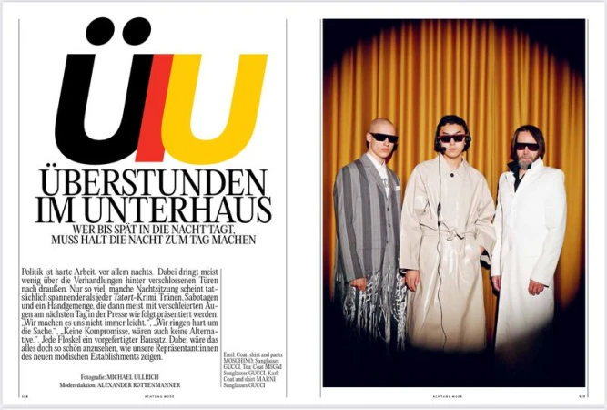 Editorial spread with bold typographic title ÜU and three models wearing sunglasses and coats against a gold curtain