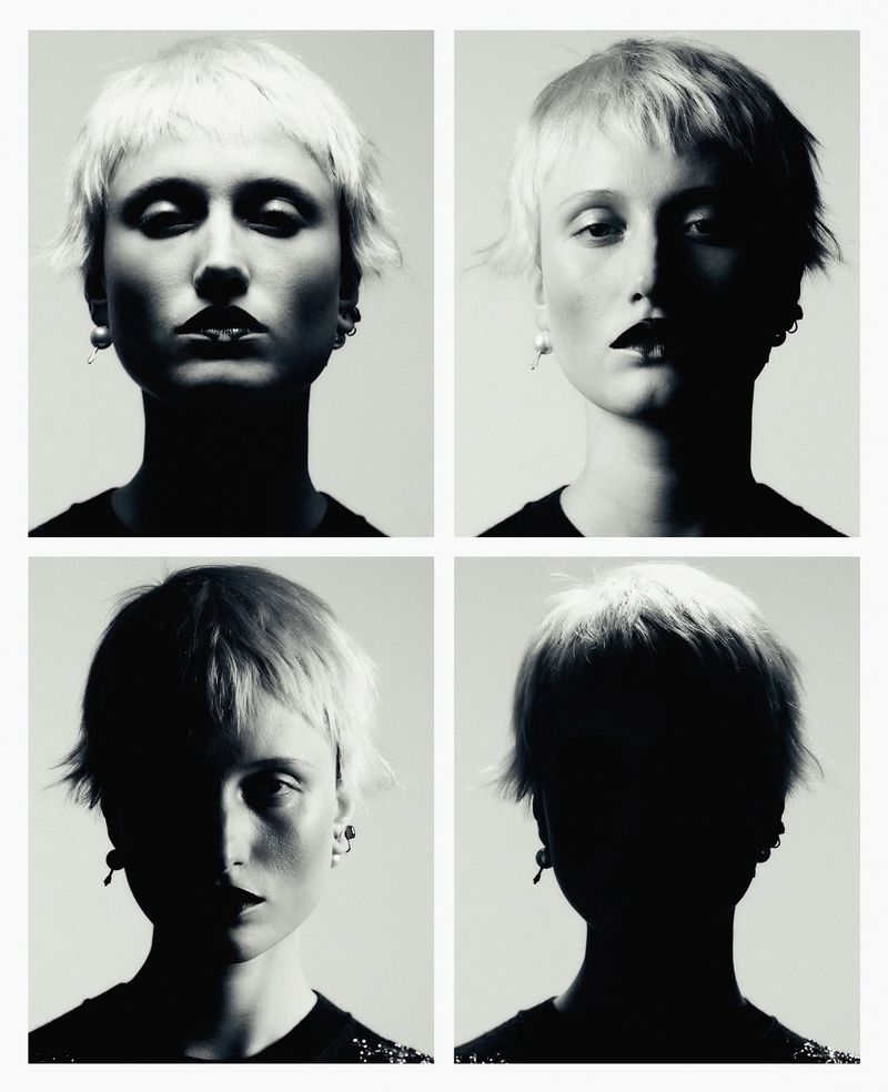Four headshot portraits of a blonde-haired woman with pale skin and dark lipstick are arranged in a grid against a neutral background.