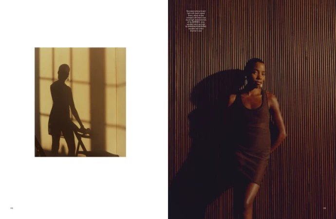 Editorial spread featuring a woman in a brown dress against a textured wood wall with dramatic shadow play and an inset silhouette.