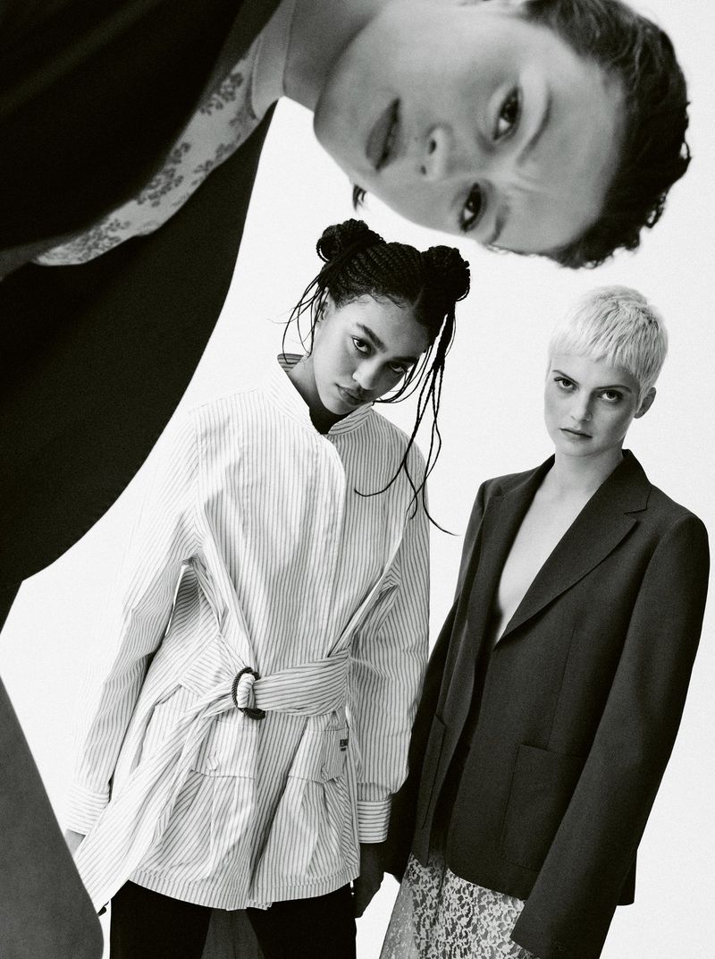 Monochrome fashion portrait of three models posing together against a plain white background for the Galpals project by Mixte.