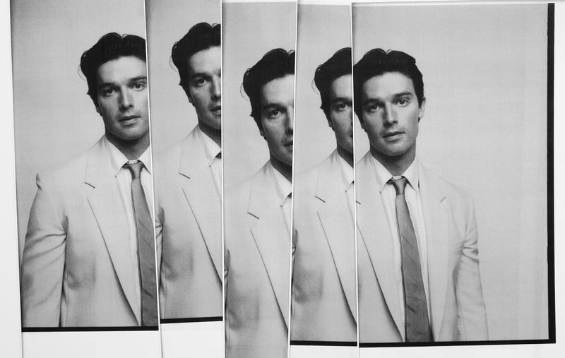 Portrait strips of Patrick Schwarzenegger wearing a light suit and tie shot for HERO Magazine.