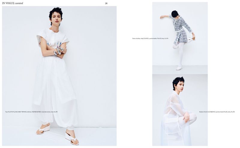 Fashion editorial featuring a slender adult female model wearing light-colored haute couture clothing, in a light and airy photo studio setting.
