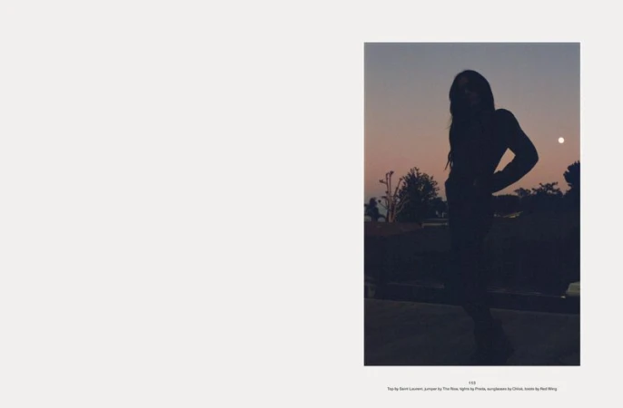 Silhouette of a woman standing outdoors against a dusk sky with a pale moon for Middle Plane Magazine Back to Zero