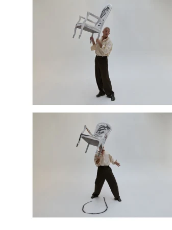 Man balances painted gray armchair overhead in photo studio with white backdrop; another photo below shows similar pose. 
