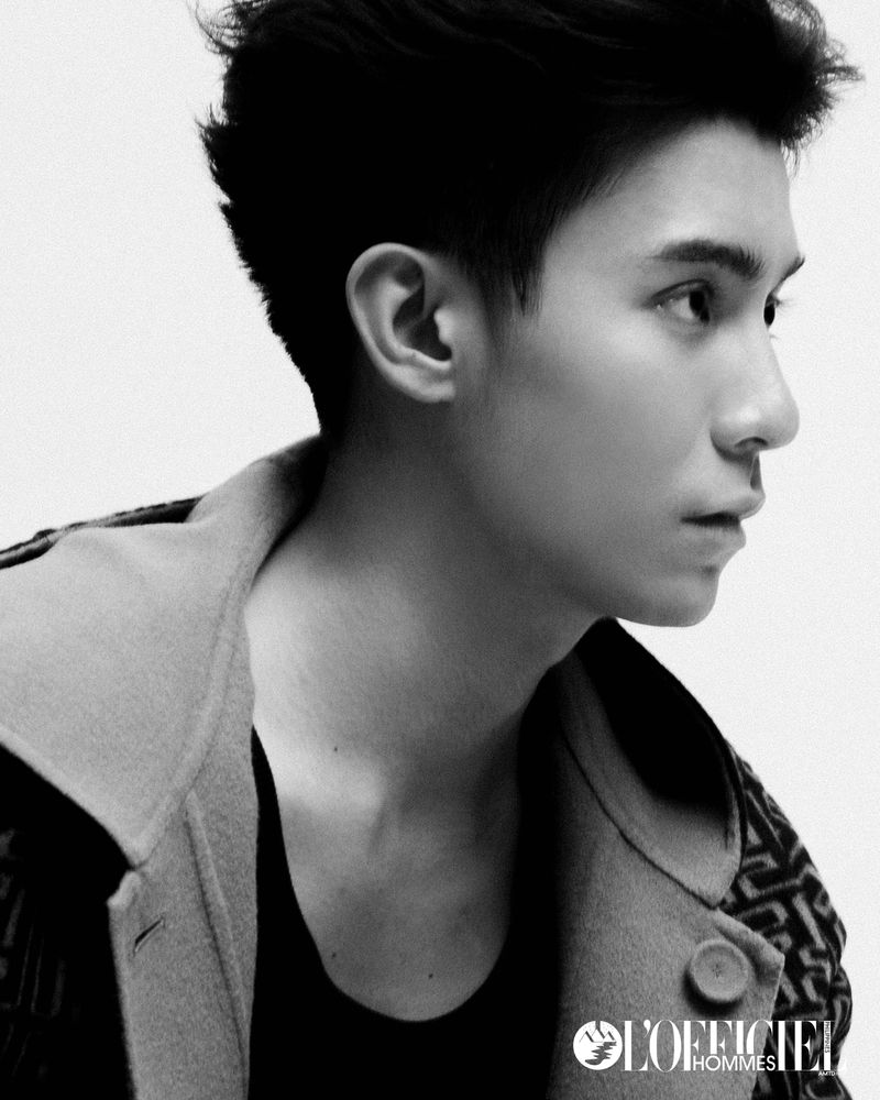 Monochrome portrait of Brent Manalo in profile wearing a patterned jacket against a plain white background for L'Officiel Philippines.