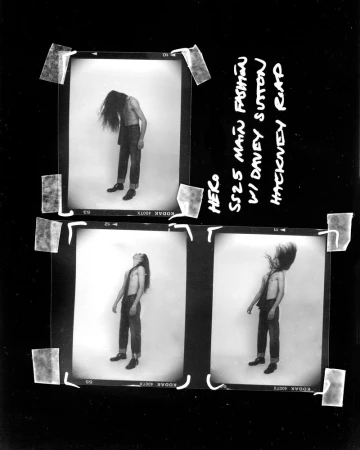 Black and white filmstrip image with a shirtless long-haired person in three poses wearing denim pants and dark shoes.