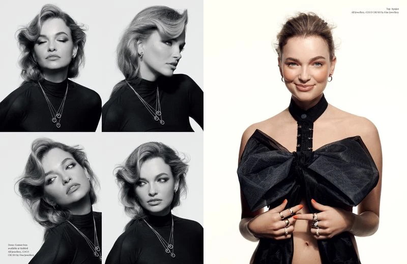 Fashion editorial shot featuring a young woman with light brown hair, wearing a black top and statement jewelry against a bright background.