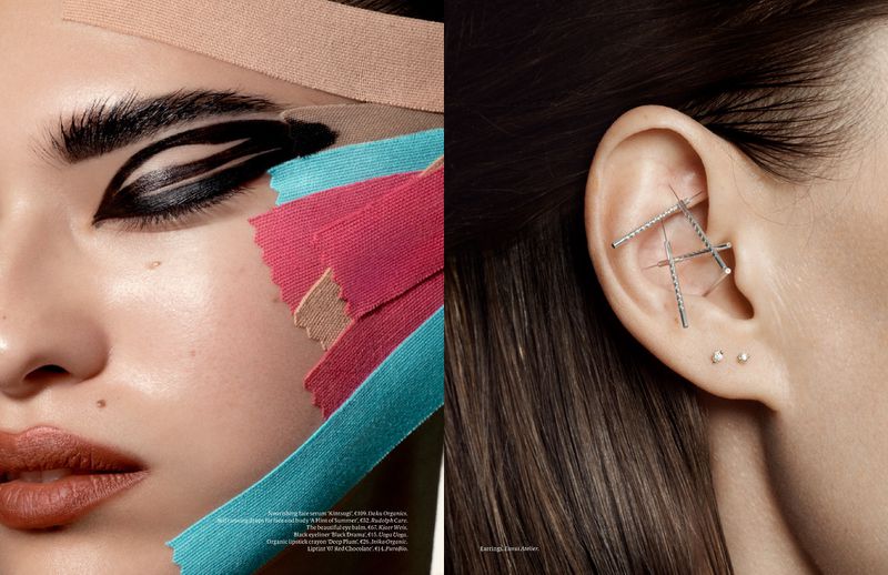 Close-up split-screen fashion beauty shot: woman's face with graphic liner & colorful tape, ear with industrial jewelry.