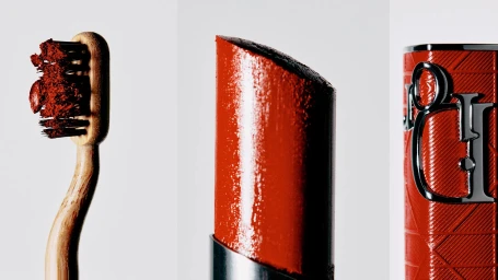 Close-up triptych featuring a wooden toothbrush covered in red pigment, red lipstick, and a textured red and silver cosmetic case.