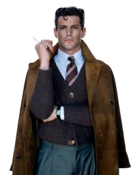 Man wearing a brown suede coat over a dark knit vest, striped tie, and holding a cigarette against a plain white background.