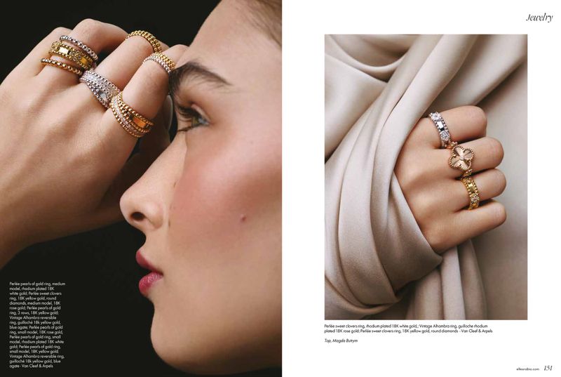 Close-up profile of a woman wearing multiple gold and diamond rings on her hand, photographed for Elle Arabia jewelry editorial
