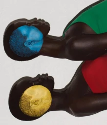 Two models with painted faces wearing green and red tops against a white background, photographed by Carlijn Jacobs for D Repubblica.