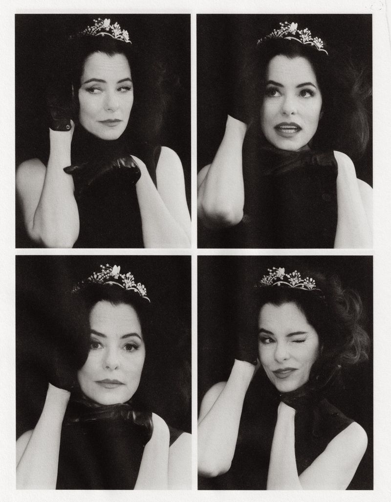 Black and white multiple portrait of a woman wearing a tiara, gloves, and a black top, against a dark background with a winking expression.