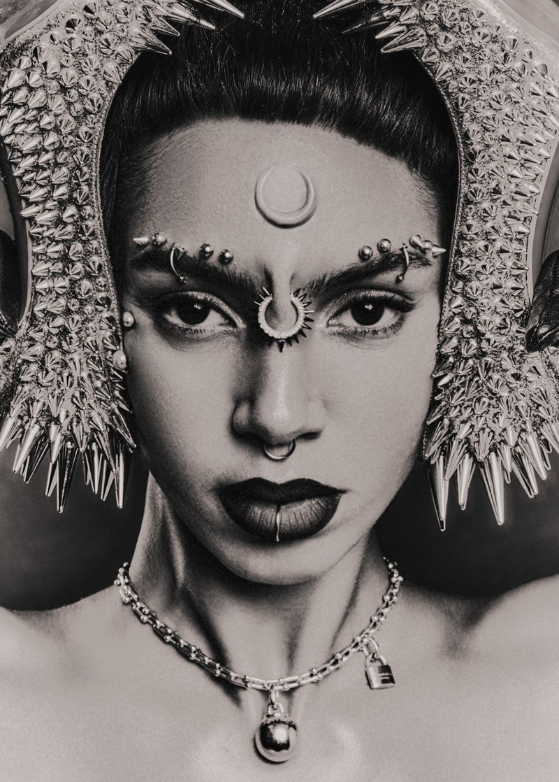 Monochromatic portrait of a woman with elaborate headdress, facial piercings, and chain necklace, rendered in a highly detailed illustration style.
