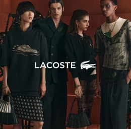 Four models posing in dark apparel for Lacoste FW25 campaign against a reddish interior background with the Lacoste logo across the center.