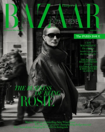Magazine cover featuring model Rosie Huntington-Whiteley in black jacket and sunglasses, against blurred urban backdrop. BAZAAR masthead.