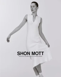 Model in a sleeveless white dress against a seamless white background for Shon Mott SS25 campaign.