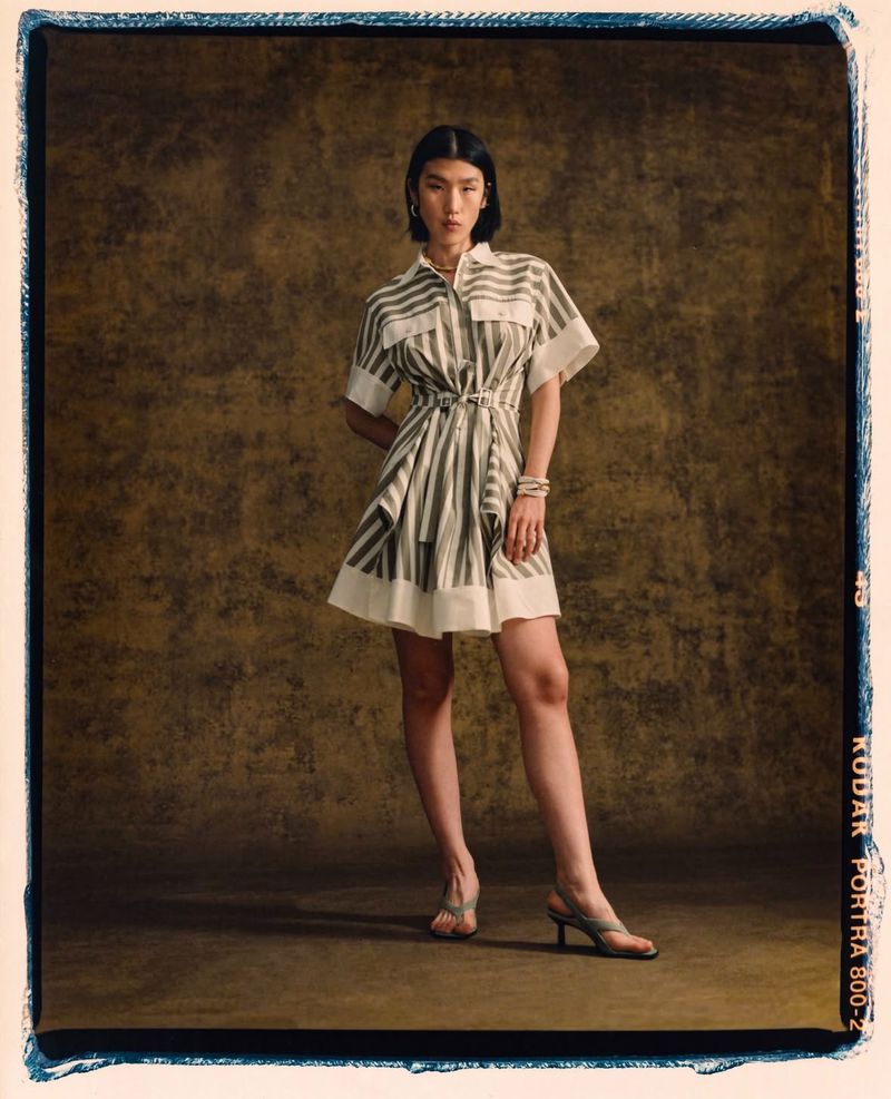 Model Jiashan Liu wearing a striped shirt dress for 3.1 Phillip Lim Pre-Fall 2025 campaign, photographed by Rasaan Wyzard.