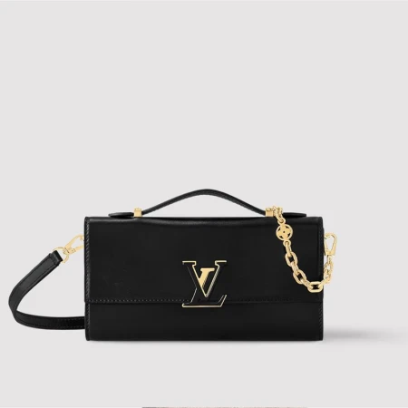 Studio shot of a black leather Louis Vuitton bag with a gold LV logo, chain strap, and handle against a neutral background.