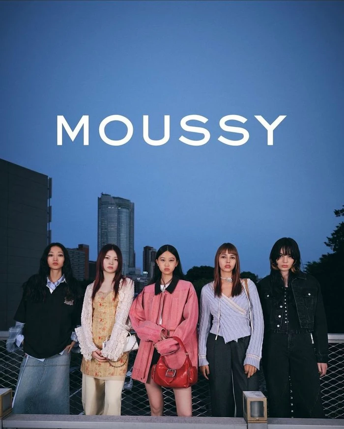 Five models posing against an urban rooftop skyline background for the Moussy Vintage Prep campaign
