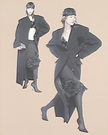 Two models wearing dark oversized blazers and hats against a pale background for The Attico S/S 25 campaign.