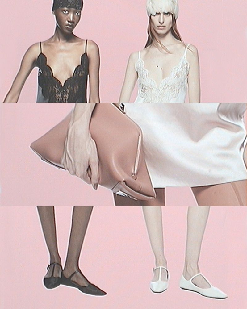 Two fashion models pose in lace tops, ballet flats, and a leather handbag against a pink backdrop. Studio shot emphasizes colors and style.