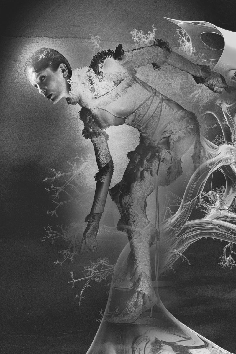 Monochrome fine art portrait of a woman in an elaborate dress against an abstract background with graphic elements and surreal textures.