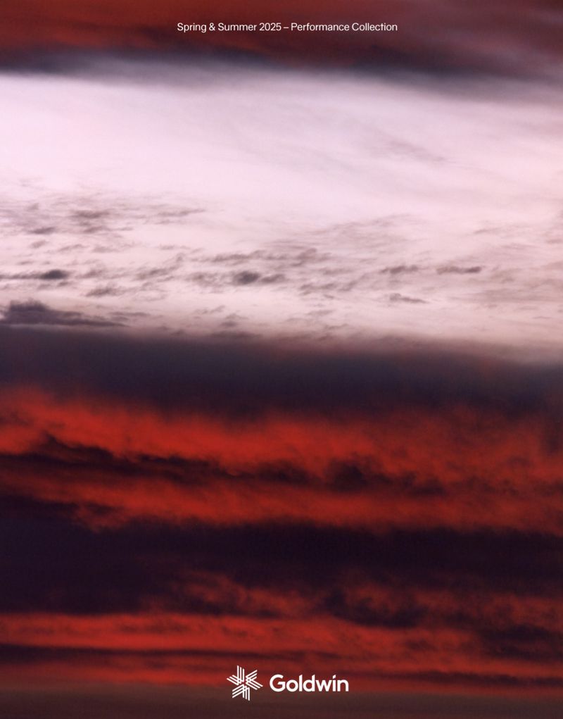 Abstract clouds at twilight feature shades of dark red, purple, and lavender in an eye-catching sky for Goldwin collection.