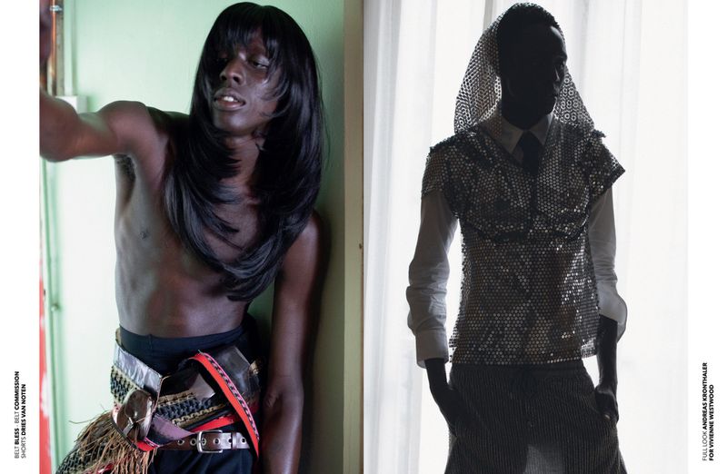 Fashion editorial shot of two dark-skinned male models in contrasting outfits: one bare-chested with elaborate belt, the other silhouetted.