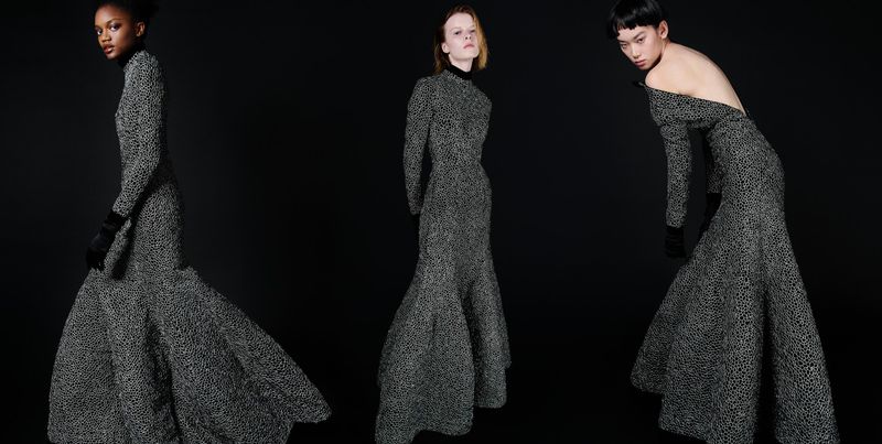 Three fashion models showcase long gowns with dotted patterns in a studio setting, emphasizing the dresses' flowing silhouettes and unique design.