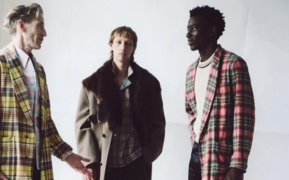 Three male models in stylish patterned coats against a neutral white studio background for Esquire UK.