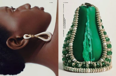 Editorial spread showing a Black woman wearing a white and gold earring beside an ornate green gemstone necklace on a sculpture.
