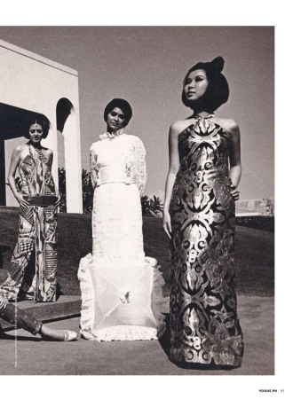 Three women in elegant dresses pose outdoors against a neutral building. They are shown in a vintage fashion editorial style.