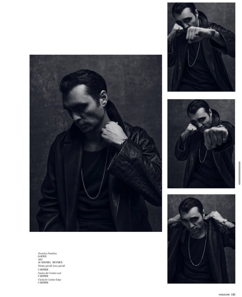 Adult male in black coat and t-shirt poses in a photo studio with various angle crops, looking at the ground, wearing a silver necklace.