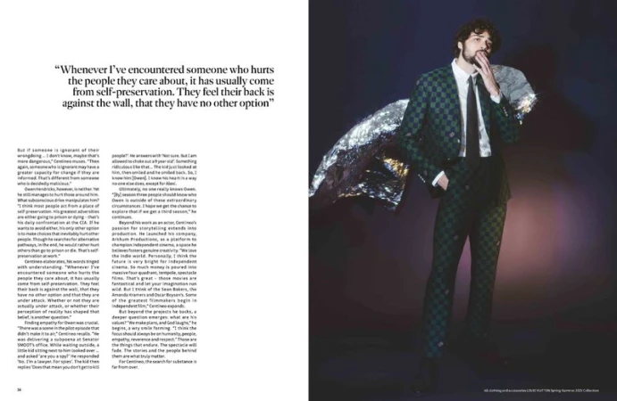 Editorial fashion shot of a stylish adult man in a green-and-black checkered suit with silver foil on the shoulder, indoors.