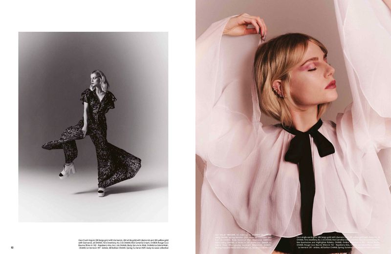 Fashion editorial featuring a blonde woman in a long patterned dress and a woman in a white blouse with a black bow.