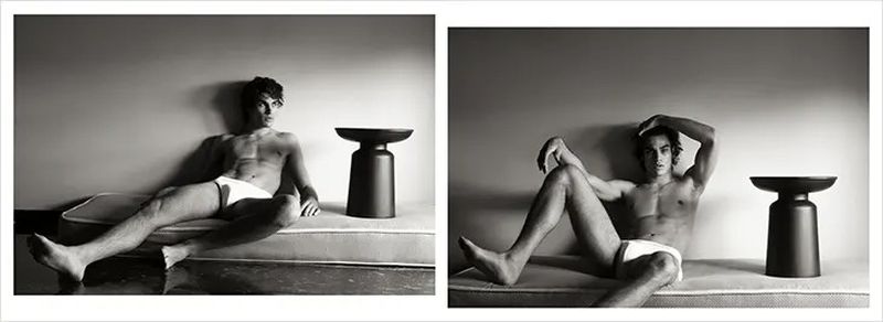 Black and white diptych of a man lounging on a mattress next to a table, eyes averted, under diffuse lighting in a studio setting.
